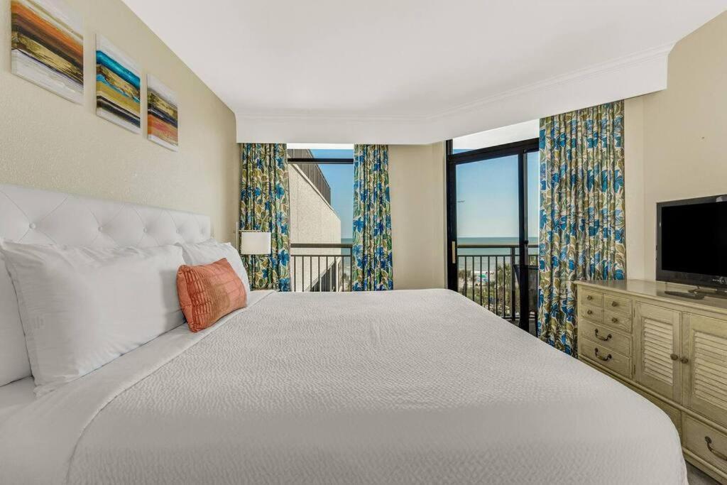 מירטל ביץ' Breathtaking Oceanfront Suite Grand Cayman 451 מראה חיצוני תמונה